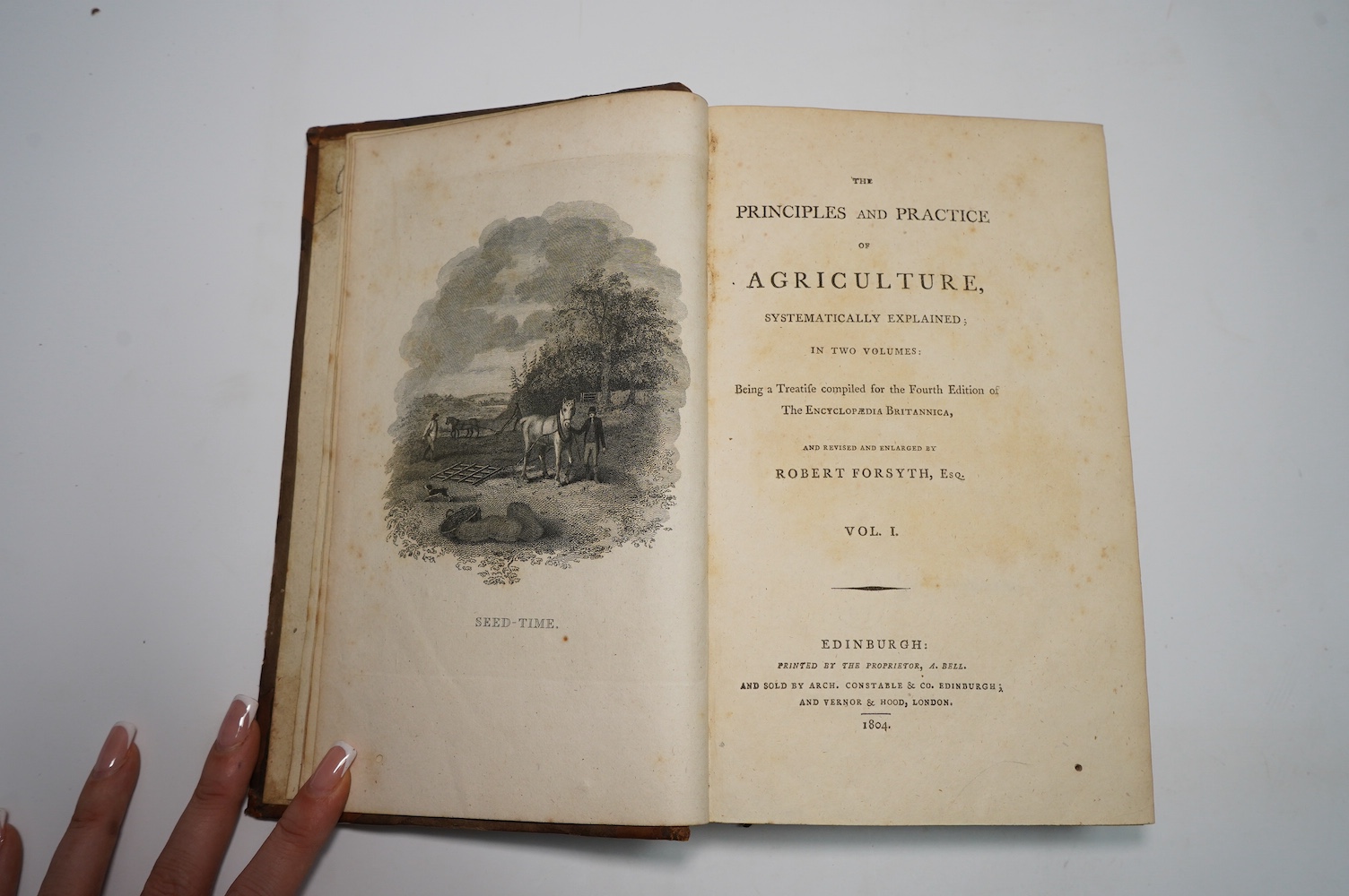 Forsyth, Robert - The Principles and Practice of Agriculture, Systematically Explained ... (revised edition), 2 vols. frontispieces and 21 plates; contemp. half calf and paper boards. Edinburgh, 1804; Sinclair, Sir John